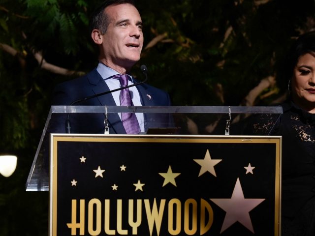 Mayor of Los Angeles Eric Garcetti and Suzette Quintanilla attend the ceremony honoring her late sister, singer Selena Quintanilla, with a Star on the Hollywood Walk of Fame on November 3, 2017, in Hollywood, California. / AFP PHOTO / TARA ZIEMBA (Photo credit should read TARA ZIEMBA/AFP/Getty Images)