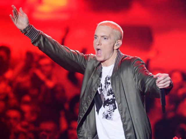 LOS ANGELES, CA - APRIL 13: Recording artist Eminem performs onstage at the 2014 MTV Movie Awards at Nokia Theatre L.A. Live on April 13, 2014 in Los Angeles, California. (Photo by Kevork Djansezian/Getty Images for MTV)