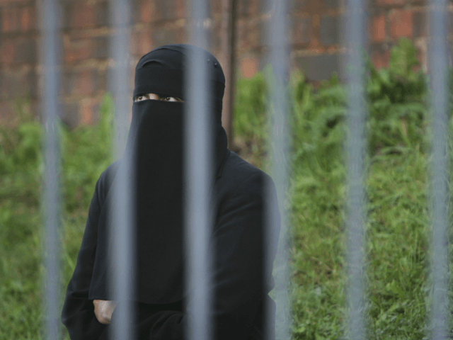BLACKBURN, UNITED KINGDOM - OCTOBER 14: Muslim women wearing niqab …