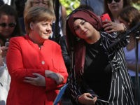 Merkel Visits Berlin Secondary School Germans