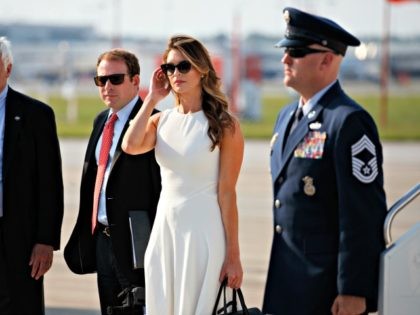 Hope Hicks stands on the tarmac as President Donald Trump is greeted as he arrives on Air Force One at John Glenn Columbus International Airport in Columbus, Ohio, Saturday, Aug. 4, 2018, en route to a rally at Olentangy Orange High School in Lewis Center, Ohio.