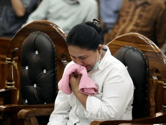 Meiliana wept as her sentence was read out at a district court in Medan, North Sumatra, In