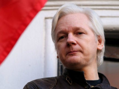 Julian Assange speaks to the media from the balcony of the Embassy Of Ecuador on May 19, 2017 in London, England. Julian Assange, founder of the Wikileaks website that published US Government secrets, has been wanted in Sweden on charges of rape since 2012. He sought asylum in the Ecuadorian …