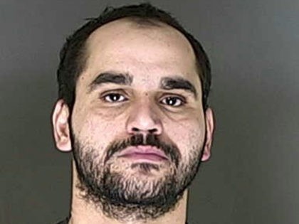 In this undated photo provided by the El Paso County Sheriff's Office is Karrar Noaman Al Khammasi. Police in Colorado Springs, Colo., say 31-year-old Karrar Noaman Al Khammasi pulled a handgun and began shooting at officers on Thursday, Aug. 2, 2018. Officer Cem Duzel was wounded and police said he …