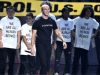 LogicVMAs1 Logic performs "One Day" onstage at the MTV Video Music Awards at Radio City Music Hall on Monday, Aug. 20, 2018, in New York. (Photo by Chris Pizzello/Invision/AP)