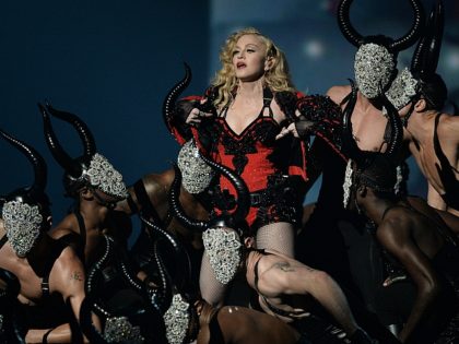 Madonna performs on stage at the 57th Annual Grammy Awards in Los Angeles February 8, 2015. AFP PHOTO/ROBYN BECK (Photo credit should read ROBYN BECK/AFP/Getty Images)
