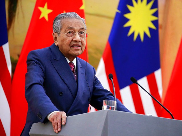 Malaysia's Prime Minister Mahathir Mohamad speaks during a joint press conference with Chi