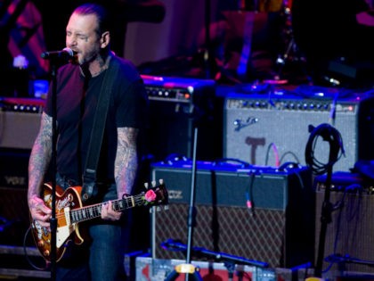Mike Ness performs at the 6th Annual Little Kids Rock benefit presented by Guitar Center at the Hammerstein Ballroom on Thursday, Oct. 23, 2014 in New York. (Photo by Stephen Chernin/Invision/AP)