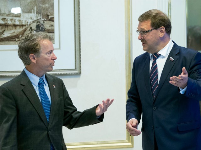 Sen. Rand Paul, left, speaks with Chairman of the Russian Federation Council Committee on International Affairs Konstantin Kosachev during their meeting in Moscow, Russia, Monday, Aug. 6, 2018. Paul said he invited Russian lawmakers to visit the United States to help foster inter-parliamentary contacts. (AP Photo/Pavel Golovkin)