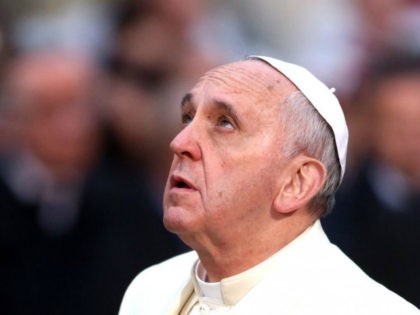 Pope Francis prays to god