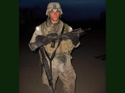 Private Sean Stokes carries home his weapon and the weapon of his fallen best friend. Stokes single-handedly killed nine terrorists in Fallujah in November 2004.