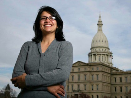 FILE - In this Thursday, Nov. 6, 2008, file photo, Rashida Tlaib, a Democrat, is photographed outside the Michigan Capitol in Lansing, Mich. In the primary election Tuesday, Aug. 7, 2018, Democrats pick former Michigan state Rep. Rashida Tlaib to run unopposed for the congressional seat that former Rep. John …