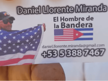 Daniel Llorente, Cuban dissident, uses U.S. flag on business card