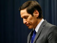 Thomas-Frieden-mic-head-down-getty Director of Centers for Disease Control and Prevention Tom Frieden addresses the media on the Ebola case in the U.S. at the Tom Harkin Global Communications Center on October 5, 2014 in Atlanta, Georgia. The first confirmed Ebola virus patient in the United States was staying with family members at …