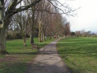 Tree-lined path Southwick Green Sussex police