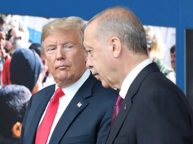 US President Donald Trump (L) talks to Turkeys President Recep Tayyip Erdogan (R) as they arrive for the NATO (North Atlantic Treaty Organization) summit, at the NATO headquarters in Brussels, on July 11, 2018. (Photo by Tatyana ZENKOVICH / POOL / AFP) (Photo credit should read TATYANA ZENKOVICH/AFP/Getty Images)
