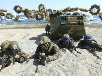 In this March 12, 2016, file photo, Marines of the U.S., left, and South Korea wearing blu