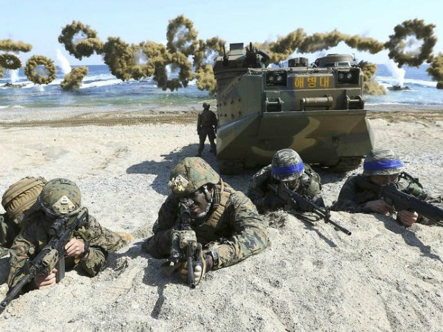 In this March 12, 2016, file photo, Marines of the U.S., left, and South Korea wearing blu