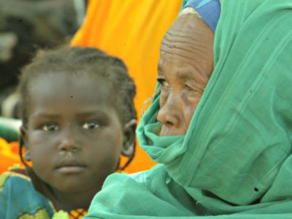A Chadian woman from the Mothers Association of School Children waits for her child at the
