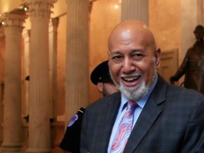Rep. Alcee Hastings, D-Fla., walks with Tunisian President Youssef Chahed, right, to a House Foreign Affairs Committee meeting on Capitol Hill in Washington, Tuesday, July 11, 2017. (AP Photo/Manuel Balce Ceneta)