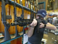 ar-15-gun-shop-utah-2-18-getty OREM, UT - FEBRUARY 15: Dordon Brack, aims a semi-automatic AR-15 that is for sale at Good Guys Guns & Range on February 15, 2018 in Orem, Utah. An AR-15 was used in the Marjory Stoneman Douglas High School shooting in Parkland, Florida. (Photo by George Frey/Getty Images)