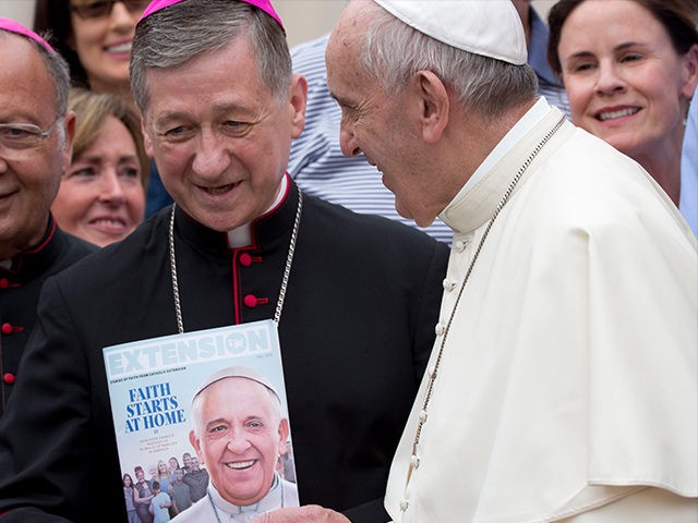 Pope Francis salutes Chicago Archbishop Blase Joseph Cupich at the end of his weekly general audience in St. Peter's Square at the Vatican, Wednesday, Sept. 2, 2015. (AP Photo/Alessandra Tarantino)