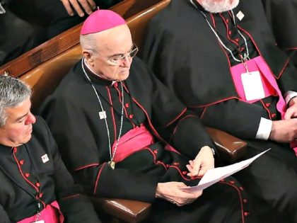 In this file photo taken on September 24, 2015 papal nuncio in Washington Archbishop Carlo Maria Vigano (C) sits among Catholic clergy and members of Congress as Pope Francis addresses a joint meeting of the US Congress in the House Chamber of the US Capitol in Washington, DC. A former …