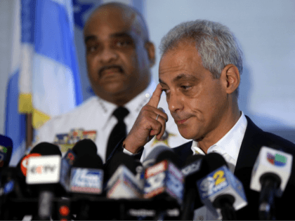 Chicago Police Superintendent Eddie Johnson listens as Chicago Mayor Rahm Emanuel speaks about Chicago's weekend of gun violence during a news conference at the Chicago Police Department 6th District station August 6, 2018 in Chicago, Illinois. Chicago experienced one of it's most violent weekends of the year, after more then …