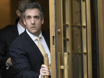 Michael Cohen, former personal lawyer to President Donald Trump, leaves Federal court, Tuesday, Aug. 21, 2018, in New York. Cohen has pleaded guilty to charges including campaign finance fraud stemming from hush money payments to porn actress Stormy Daniels and ex-Playboy model Karen McDougal. (AP Photo/Mary Altaffer)
