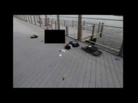 This is the scene after a police officer fatally shot Joshua Gomoll on the Trestle Trail in Fox Crossing May 23, 2018. Gomoll's body is behind the black rectangle, and the knife investigators say he had is at the bottom of the photo. The rest of the objects are police and first aid equipment. (Photo courtesy Wisconsin DCI) This is the scene after a police officer fatally shot Joshua Gomoll on the Trestle Trail in Fox Crossing May 23, 2018. Gomoll's body is behind the black rectangle, and the knife investigators say he had is at the bottom of the photo. The rest of the objects are police …