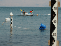 israel drought Israel children play on August 24, 2008 on a boat near water measurement scales at the Sea of Galilee in northern Israel, which has seen a big decrease of its water level. The Jordan River supplies 95% of the water in the Sea of Galilee sweet lake. After four consecutive …