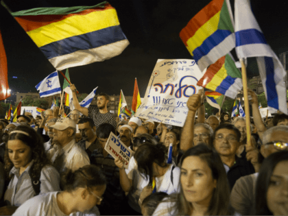 Thousands demonstrators take part in a protest against the 'Jewish State Nation Law' in Rabin Square on August 4, 2018 in Tel Aviv, Israel. The rally organized by Druze community members is in protest of the law that declares Israel the exclusive homeland of Jewish people. (Photo by Amir Levy/Getty …
