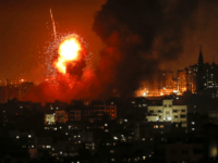 A picture taken on August 8, 2018 shows a fireball exploding during Israeli air strikes in Gaza City. (Photo by MAHMUD HAMS / AFP) (Photo credit should read MAHMUD HAMS/AFP/Getty Images)
