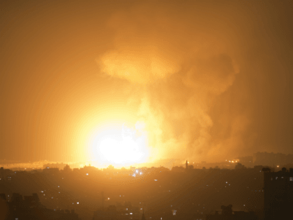 An explosion caused by Israeli airstrikes on Gaza City, early Thursday, Aug. 9, 2018. Israel struck targets in the Gaza Strip after dozens of rockets were launched Wednesday from the coastal territory ruled by the Islamic militant Hamas group, the Israeli military said. (AP Photo/Khalil Hamra)