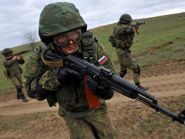 Russian military troops take part in a military drill on Sernovodsky polygon close to the Chechnya border, some 260 km from south Russian city of Stavropol, on March 19, 2015. About 500 soldiers take part in the military exercises until March 20. AFP PHOTO / SERGEY VENYAVSKY (Photo credit should …