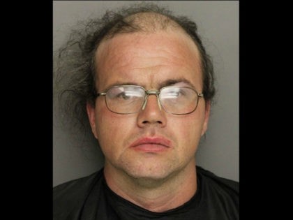 Shawn Thomas Hallett, wearing a dress and a wig, was arrested after a woman accused him of filming her in the woman’s bathroom of a Greenville, South Carolina, gas station.