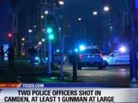 shot Two officers were ambushed Tuesday night in Camden, New Jersey, and shot while sitting in their police car at a red light.