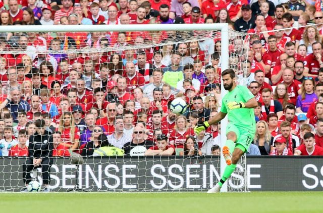 Liverpool thrash Napoli as Alisson makes debut