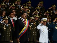 Venezuelan President Nicolas Maduro (C) attends a ceremony to celebrate the 81st anniversary of the National Guard in Caracas on August 4, 2018 Venezuelan President Nicolas Maduro (C) attends a ceremony to celebrate the 81st anniversary of the National Guard in Caracas on August 4, 2018