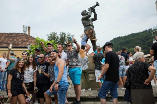 Revellers descend on Serbian town for raucous trumpet festival