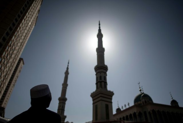 China delays mosque demolition after protest