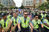 Police escort far-right demonstrators during a rally at Lafayette Park opposite the White House