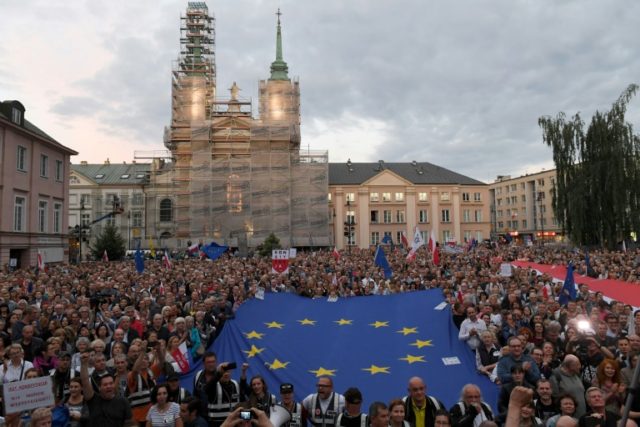 EU ramps up legal threat to Poland over court reform