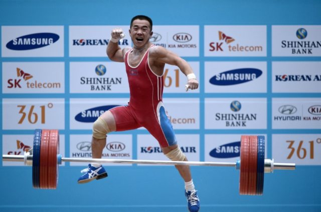 Tarnished weightlifting fights for Olympic survival at Asian Games