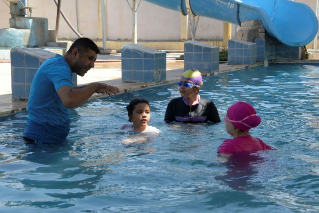 Iraqi girls take up swimming in IS-free Mosul