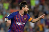 Lionel Messi scored twice, including Barcelona's 6,000th goal in La Liga, as they beat Alaves 3-0