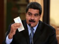 Venezuelan President Nicolas Maduro unveiled the country's new sovereign bolivar -- along with a raft of economic reform measures -- ahead of a currency relaunch Venezuelan President Nicolas Maduro unveiled the country's new sovereign bolivar -- along with a raft of economic reform measures -- ahead of a currency relaunch