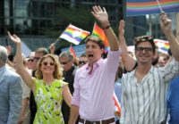 "It's great to celebrate today with everyone. Bonne fierte. Happy Pride," Justin Trudeau told the crowd, dressed in a pale pink shirt and white trousers.