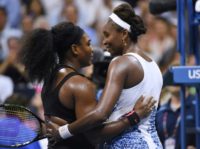 Family ties: Serena Williams hugs sister Venus after they met in the quarter-finals of the US Open in 2015