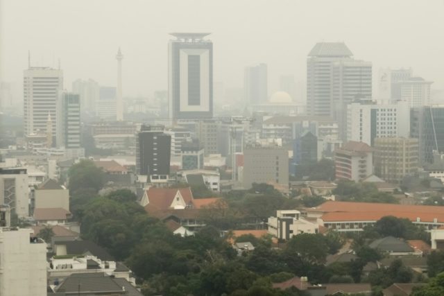 Protesters scale billboard in Asiad-host Jakarta over toxic air